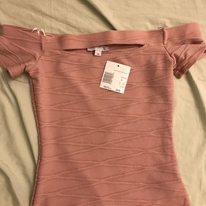 Off shoulder top with beautiful chest slit!